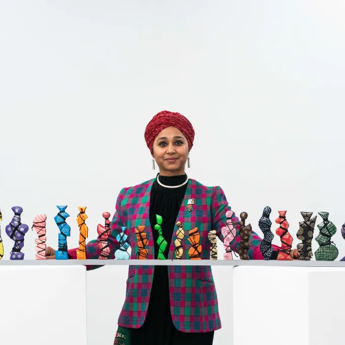 Mee Jay poses with her untitled work